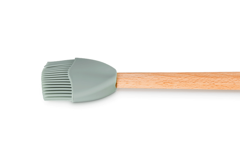 Side view of Signature Silicone Basting Brush with crown-shaped sea salt silicone bristles and beech wood handle