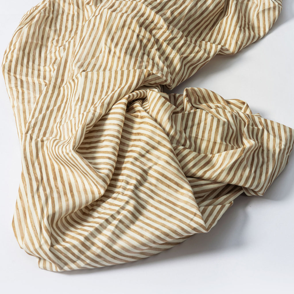 Crib Sheet in GOTS Certified Organic Brushed Cotton by Nate Berkus in Autumn Stripe