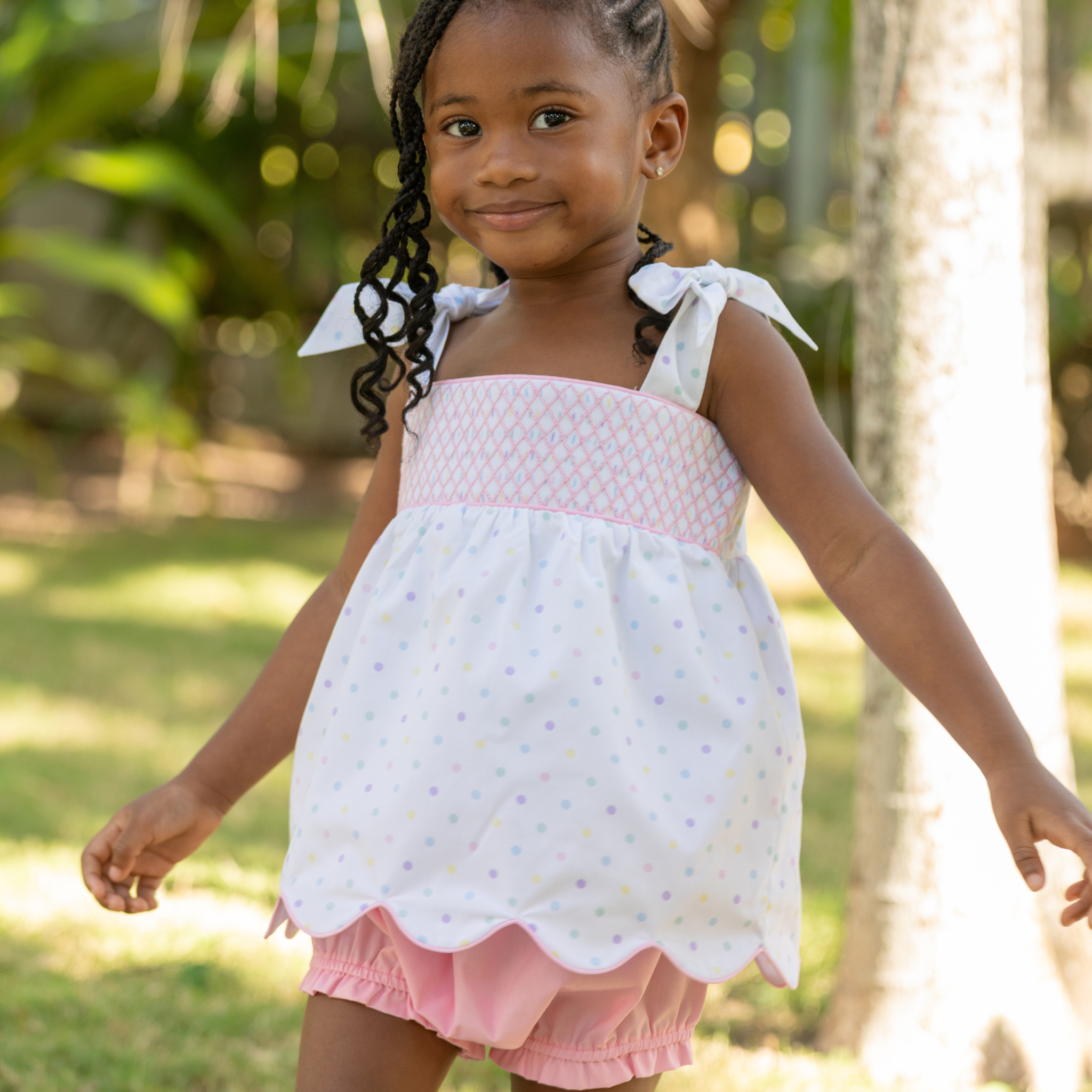 Henry Duvall Betsy Bloomer Set with hand-smocked top in Dumnore Dot print and matching pink bloomers, classic heirloom baby girl summer outfit with shoulder ties