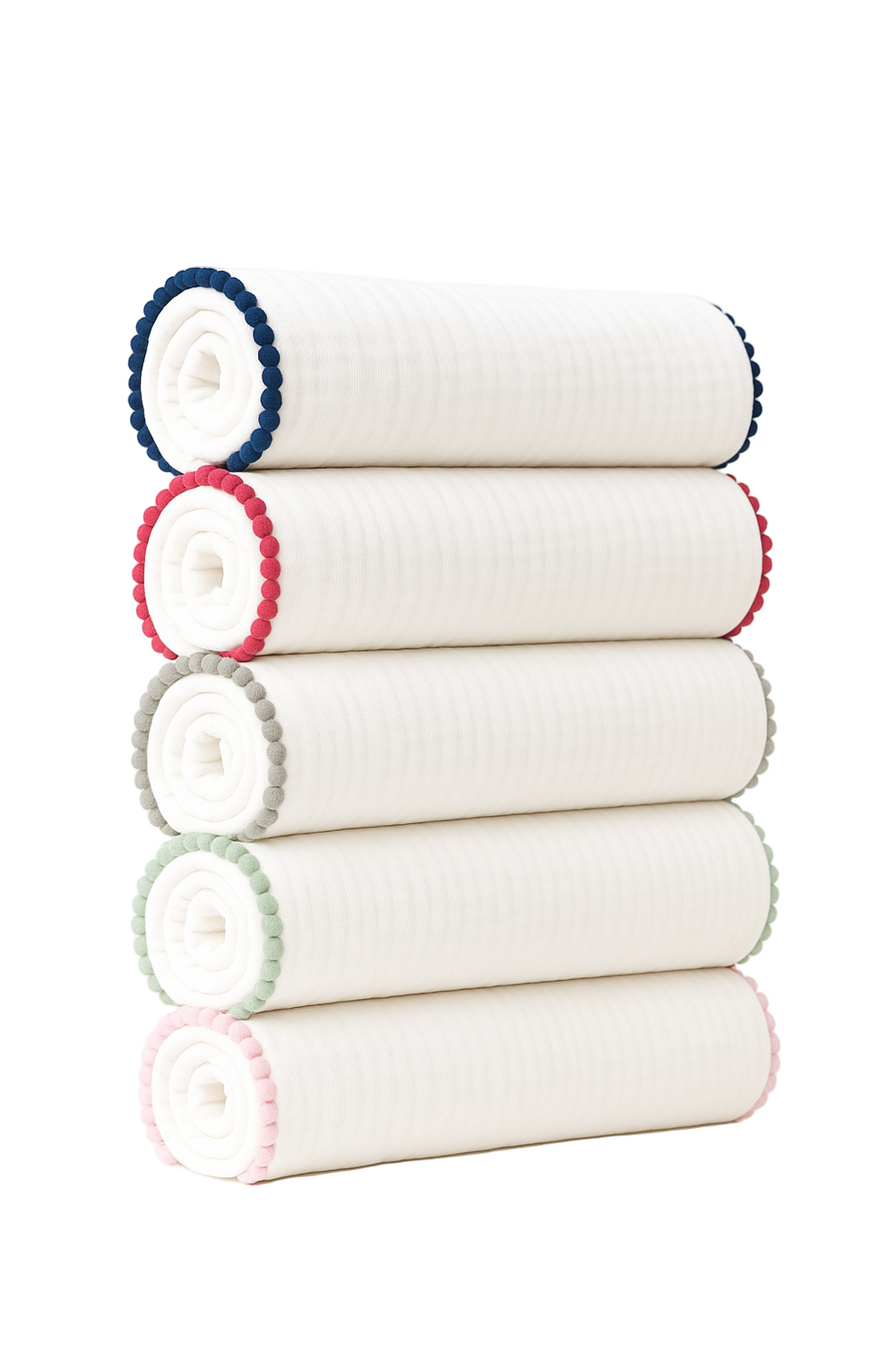 Front view of stacked rolled cotton muslin swaddle blankets showcasing colored pom-pom edge trim on white background