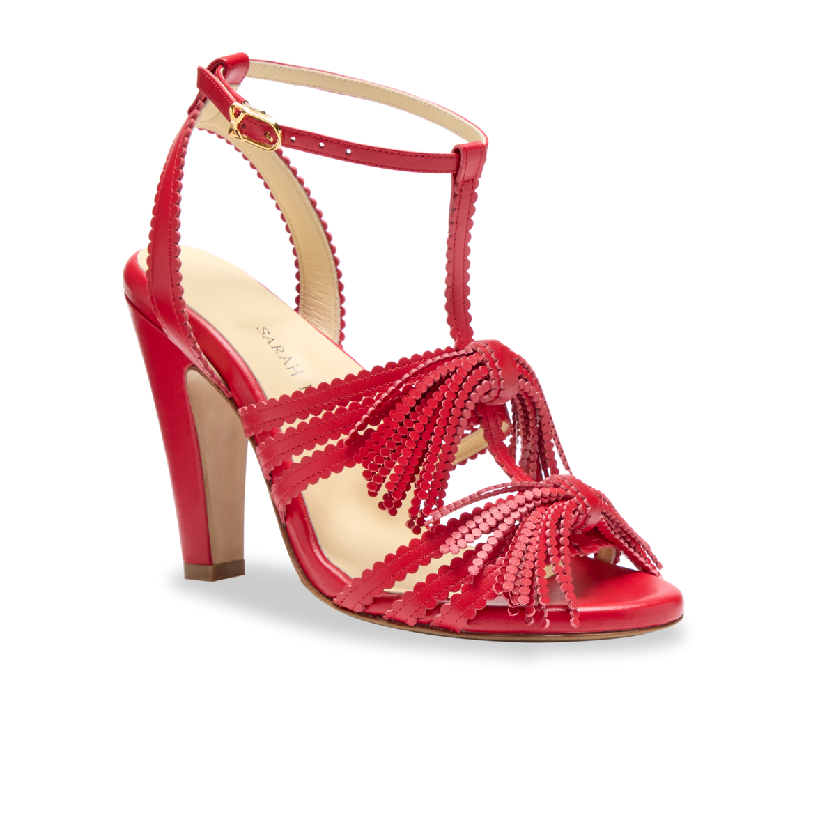 Side view of Perfect Kathryn 100 sandal showcasing rose red calf leather, tassel details, and block heel on white background