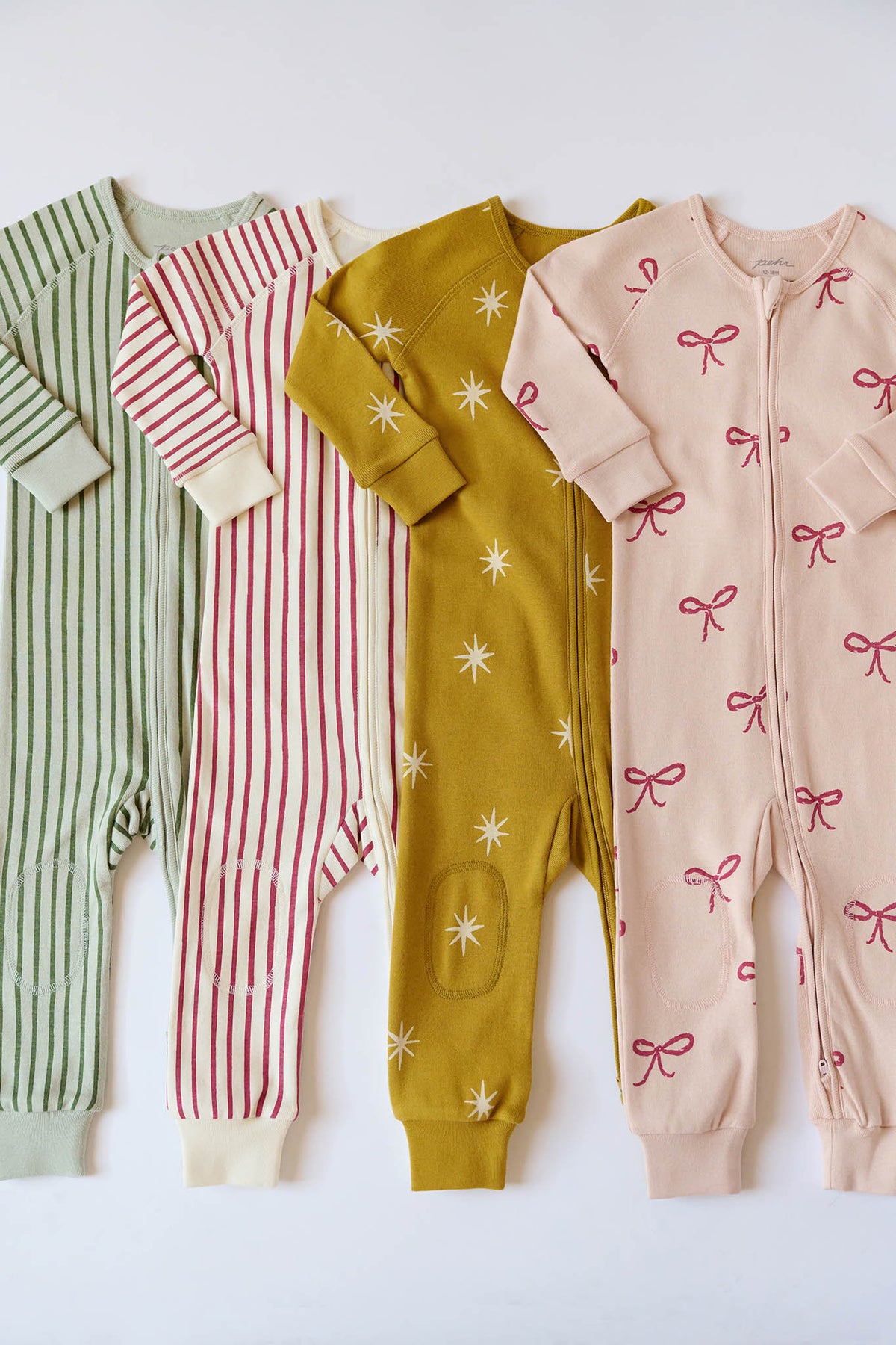 Flat lay of Ribbed Baby Footless Sleeper in Stripes Away Evergreen showing ribbed knit, full front zipper, and cuffed ankles on white background