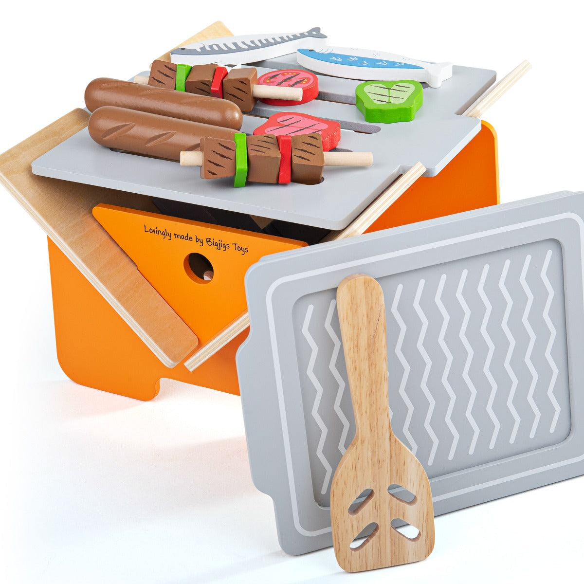 Angled view of Table Top Toy BBQ showcasing removable grill and colorful play food on a white background