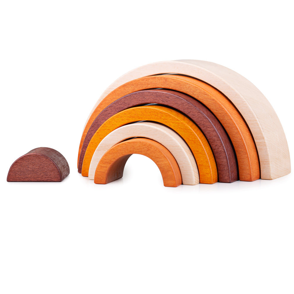 Front view of Natural Stacking Rainbow showcasing seven wooden arches in warm natural shades with a white background