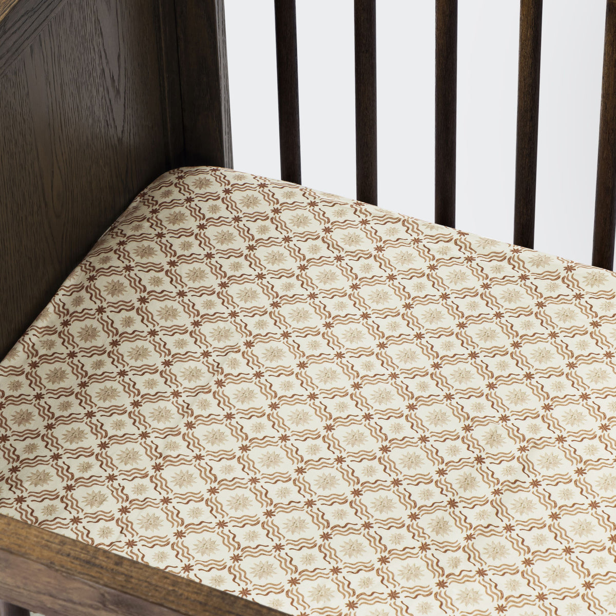 All-Stages® Midi Crib Sheet in GOTS Certified Organic Brushed Cotton by Nate Berkus in Autumn Star
