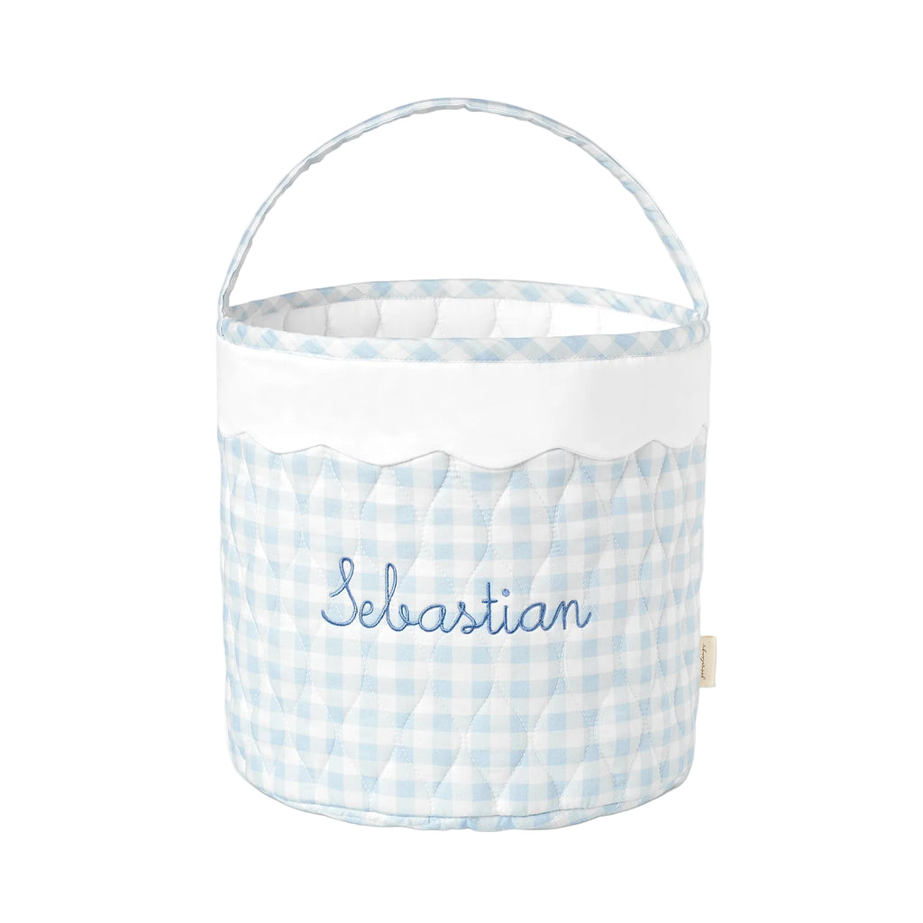 Blue gingham quilted bucket-style basket with scalloped trim and handle.