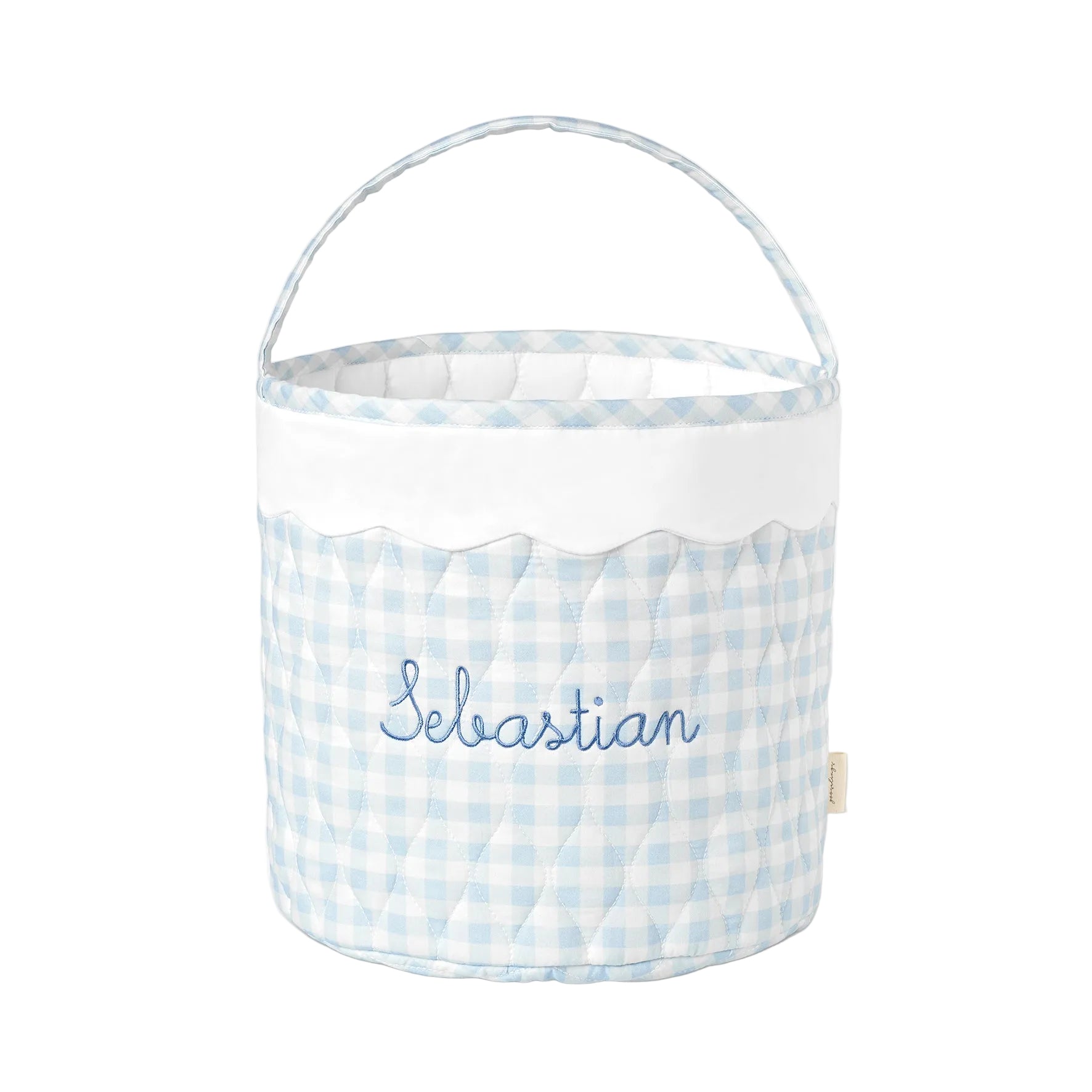 Blue gingham quilted bucket-style basket with scalloped trim and handle.