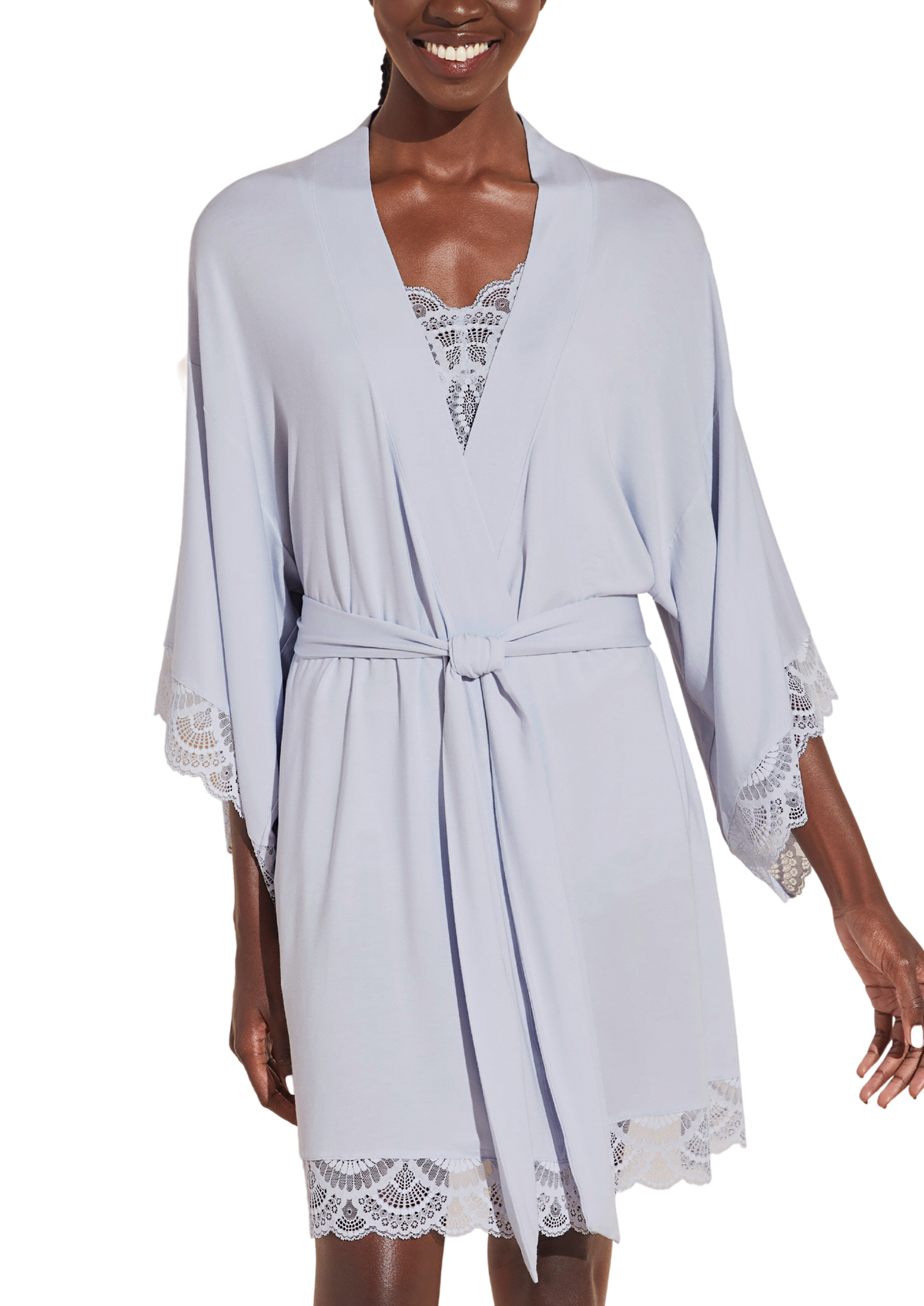 Front view of Mariana Short Robe in ice blue on model, showing lace-trimmed sleeves and hem and tied belt