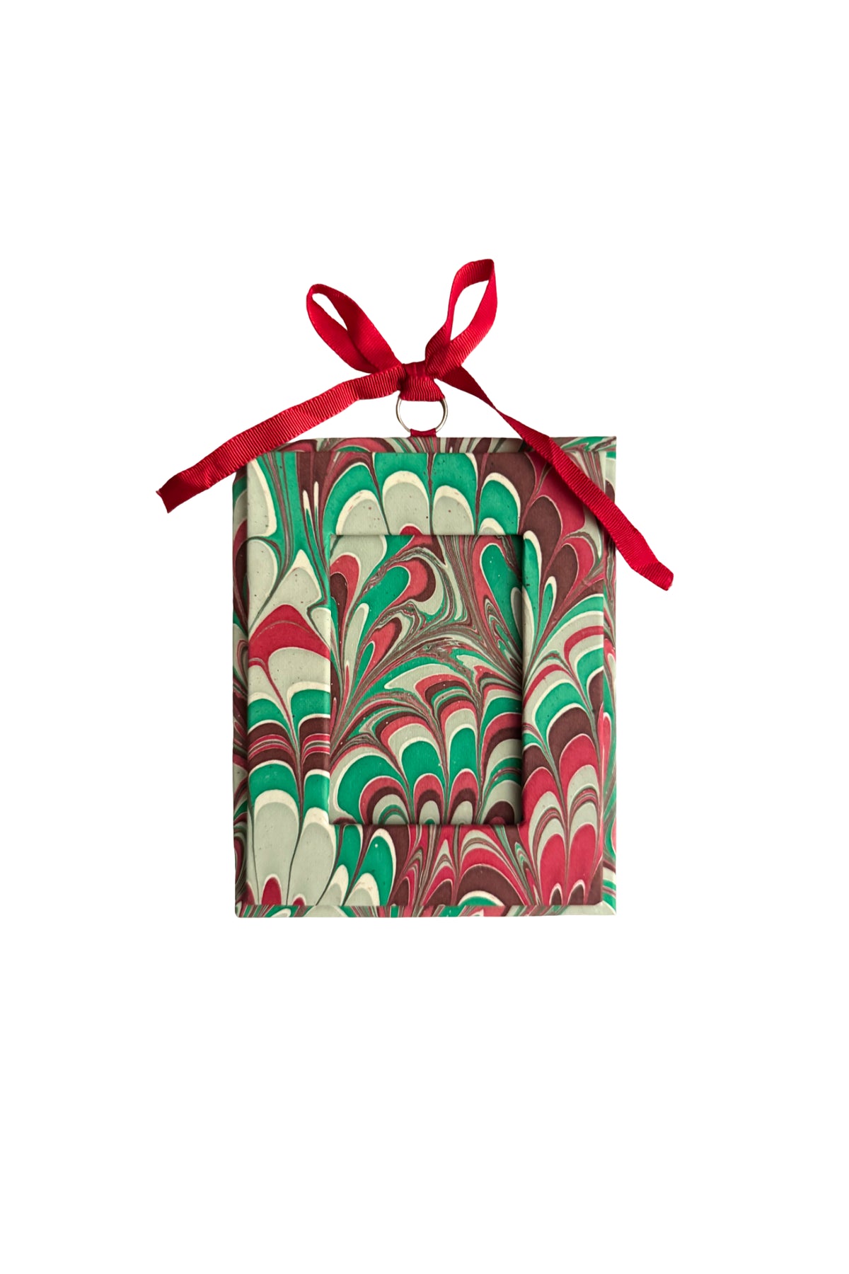 Festive marble-patterned holiday picture frame ornament with red ribbon bow