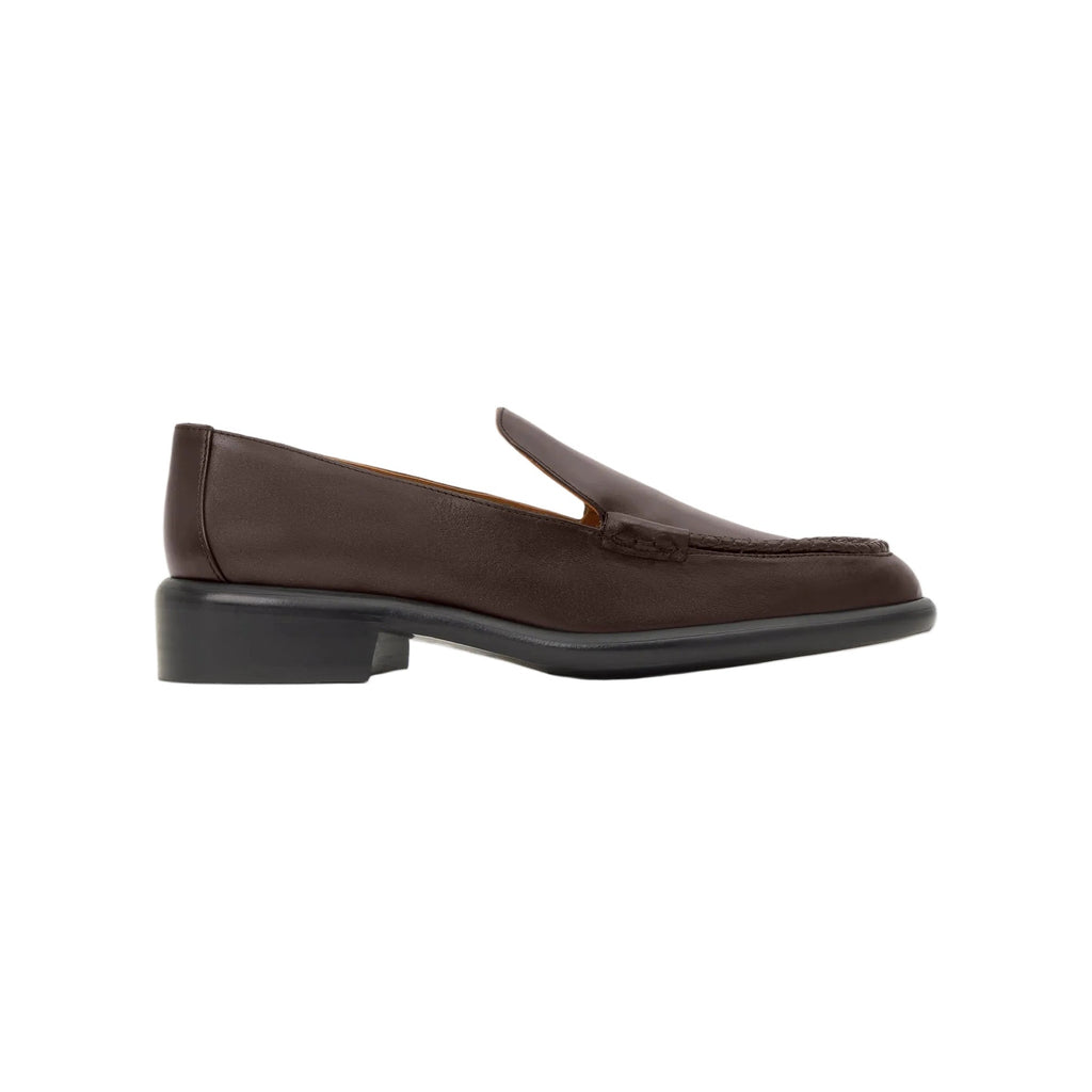 Side view of Erika flat buffalo nappa moccasin showcasing braided trim with a white background