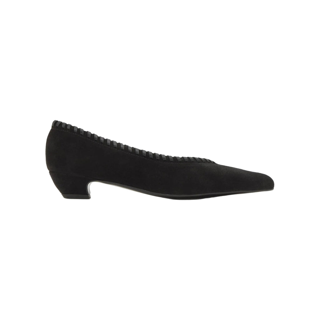 Side view of the Thais in Black suede kitten heel ballerina showcasing its pointed toe and low heel against a white background