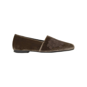 Side view of Gisele velvet slipper in brown showcasing floral embroidery and flat silhouette on a white background