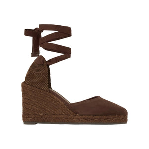 Side view of the Joyce 8 in Brown suede espadrille showcasing its pointed toe, ribbon tie closure, and hand-stitched tinted jute wedge on white