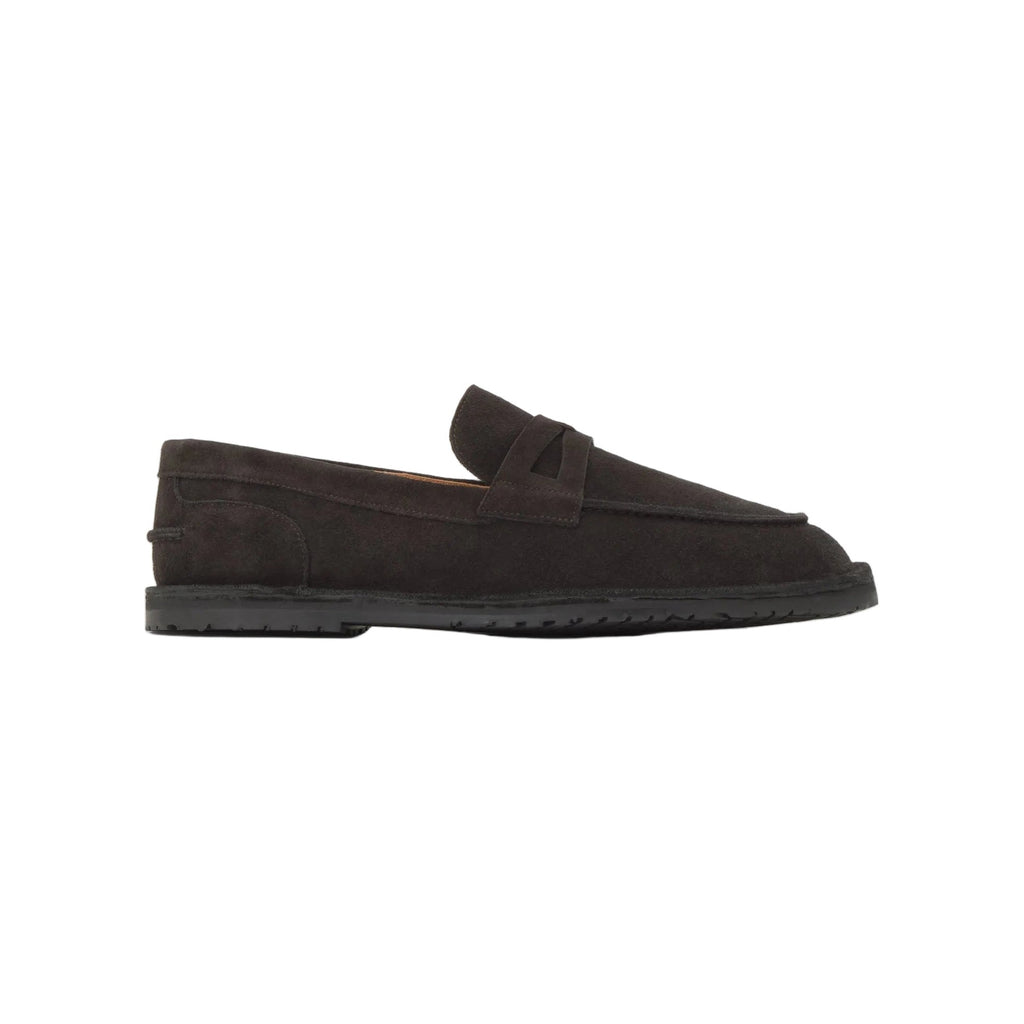 Side view of the brown suede Lois penny loafer showcasing its penny strap, visible stitching, and TPU sole on white
