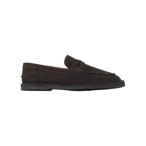 Side view of the brown suede Lois penny loafer showcasing its penny strap, visible stitching, and TPU sole on white