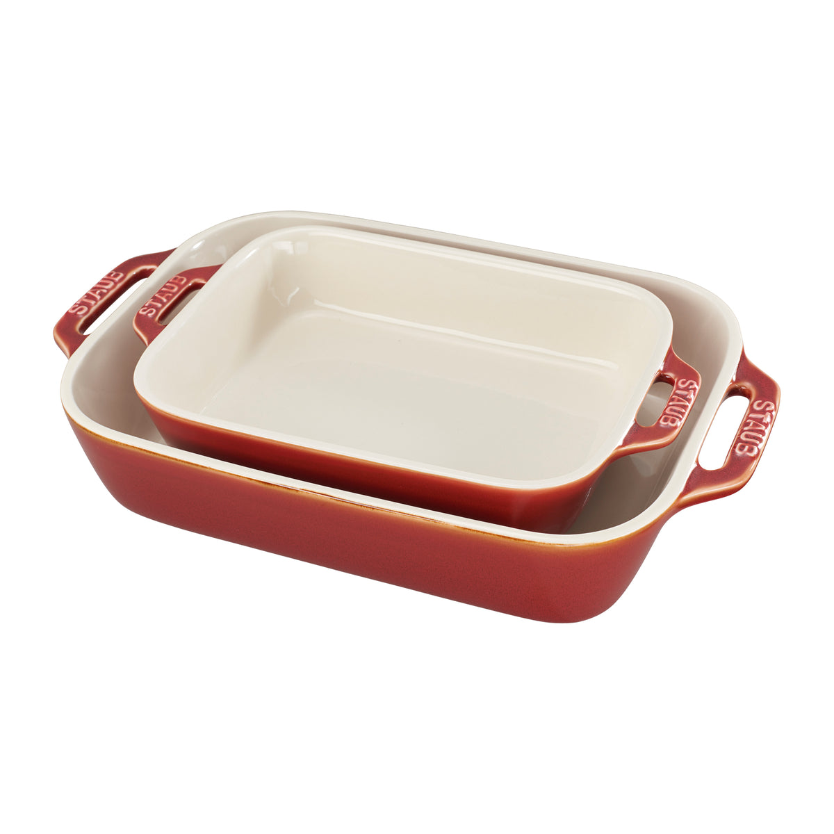 Angled view of Ceramic 2-pc Rectangular Baking Dish Set showcasing two nested red dishes with handles on white background