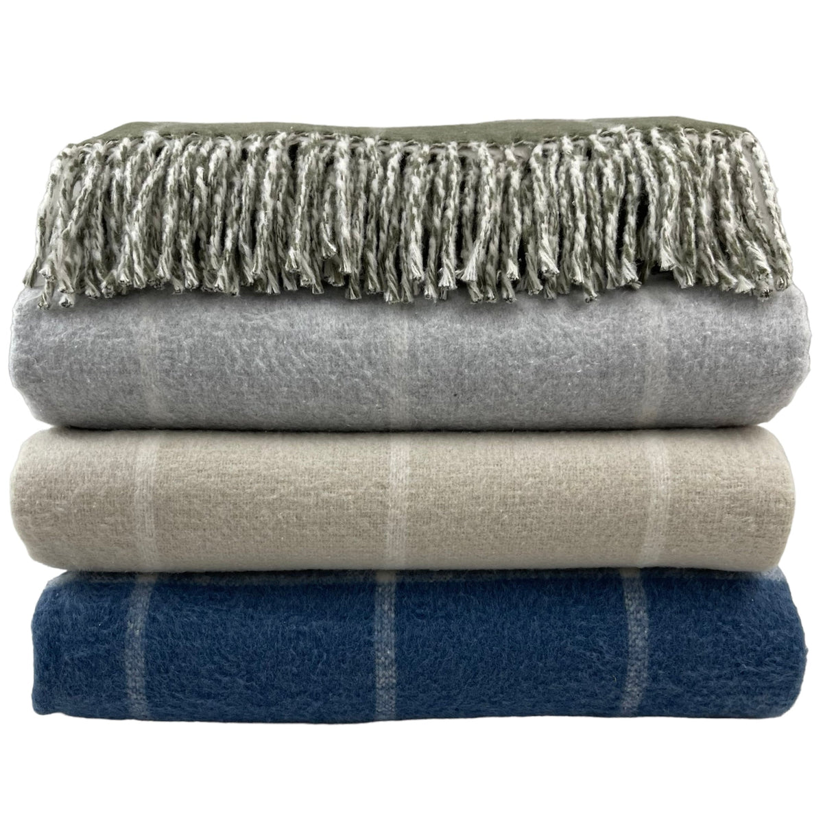 Front-facing stack of Windowpane throws with windowpane pattern and fringe in green, light grey, sand, and denim