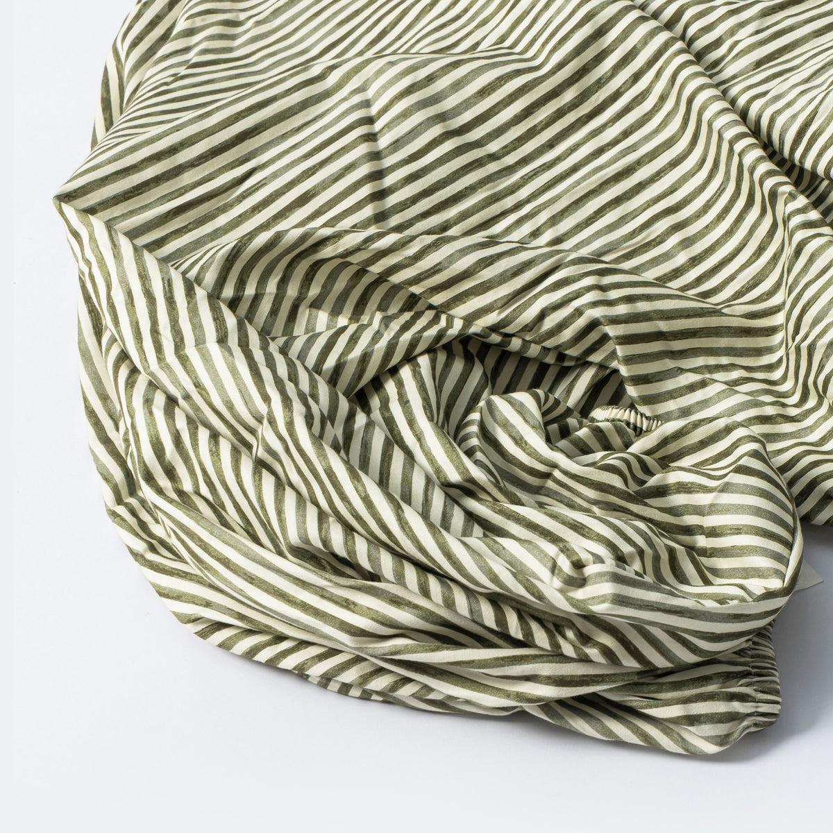 Crib Sheet in GOTS Certified Organic Brushed Cotton by Nate Berkus in Juniper Stripe