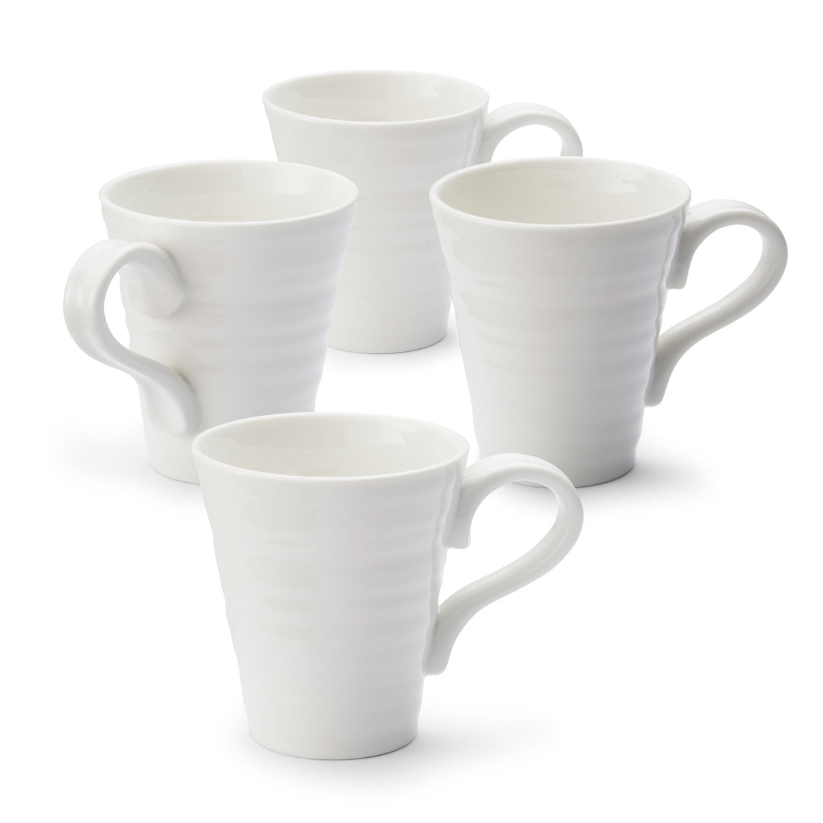 Front view of Sophie Conran Mugs, Set of 4 showcasing white porcelain mugs with curved handles on a white background