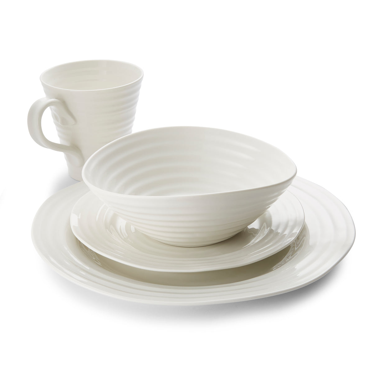 Close-up view of Sophie Conran 4-Piece Place Setting showcasing a dinner plate, salad plate, bowl, and mug on white