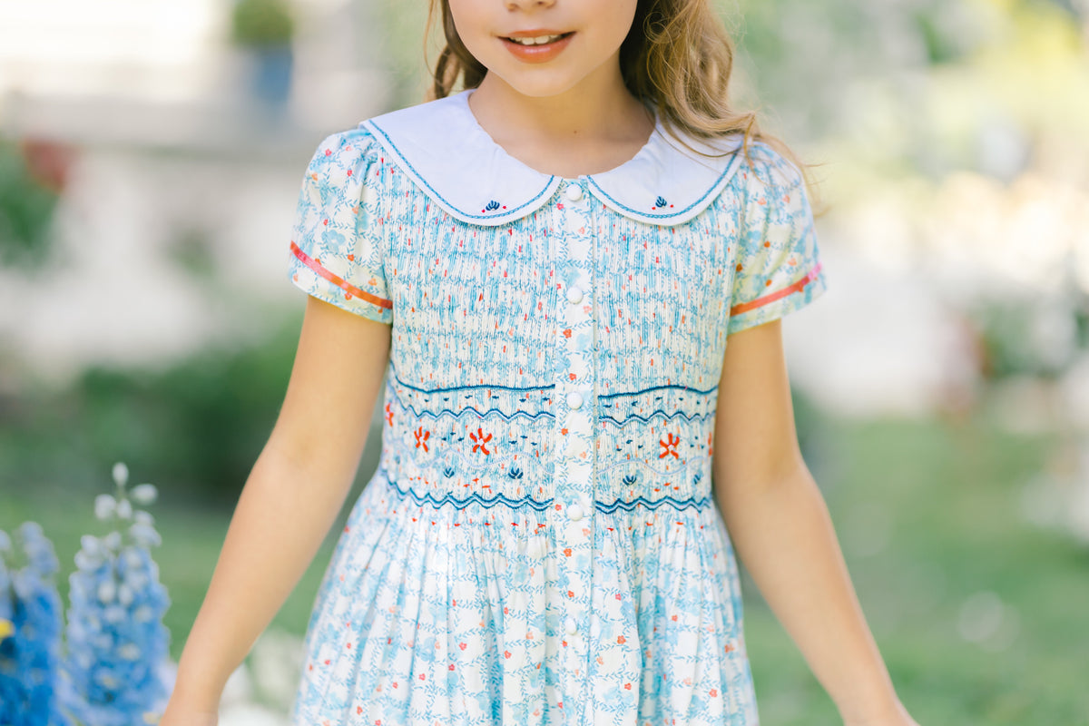 Riviera Floral Blue Short Sleeve Smocked Dress