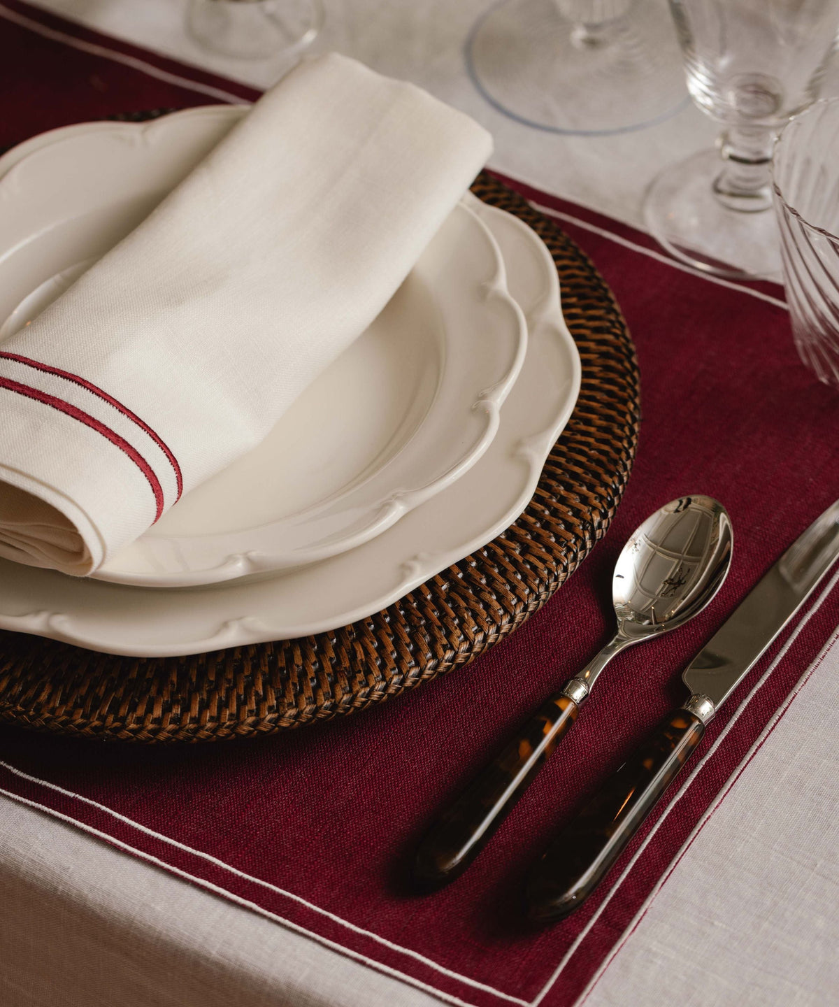 Rebecca Udall Sophie Classic Two Cord Napkin, Burgundy with the Rattan Charger