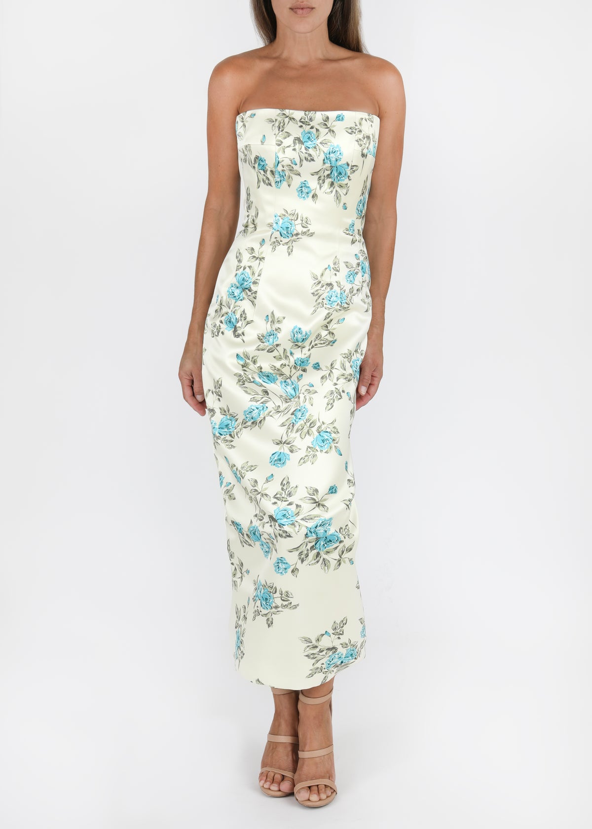 Front view of Leila Floral Dress in Blue Turquoise showcasing strapless styling and hip draping on a model