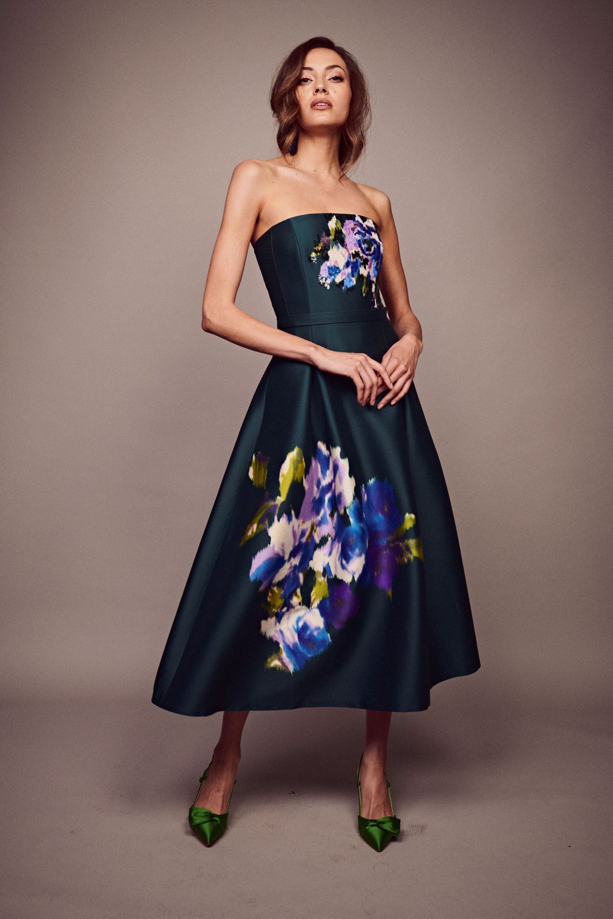 Front view of Shay Dress in Forest Green Placement Ikat showcasing strapless bodice and A-line skirt on neutral background