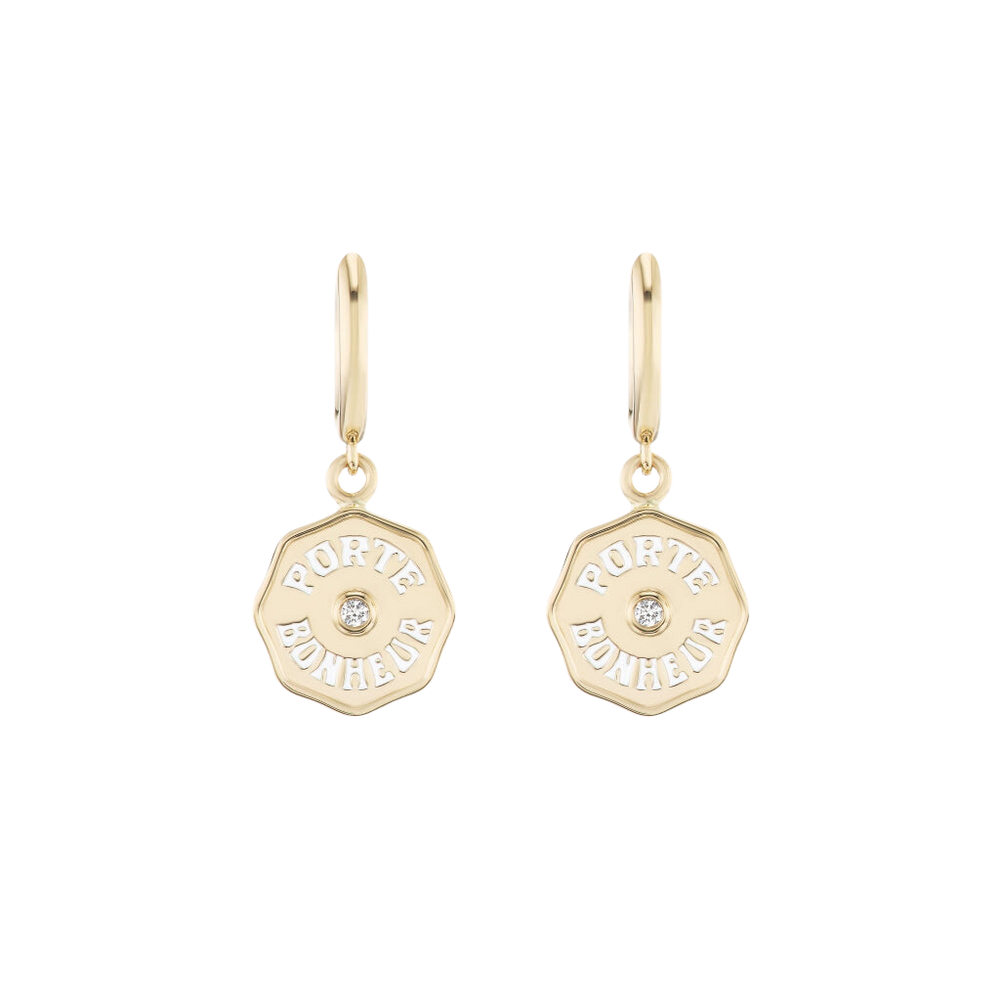 Front view of Wee PB Hoops earrings showcasing Porte Bonheur coin charms with center white diamonds on black background