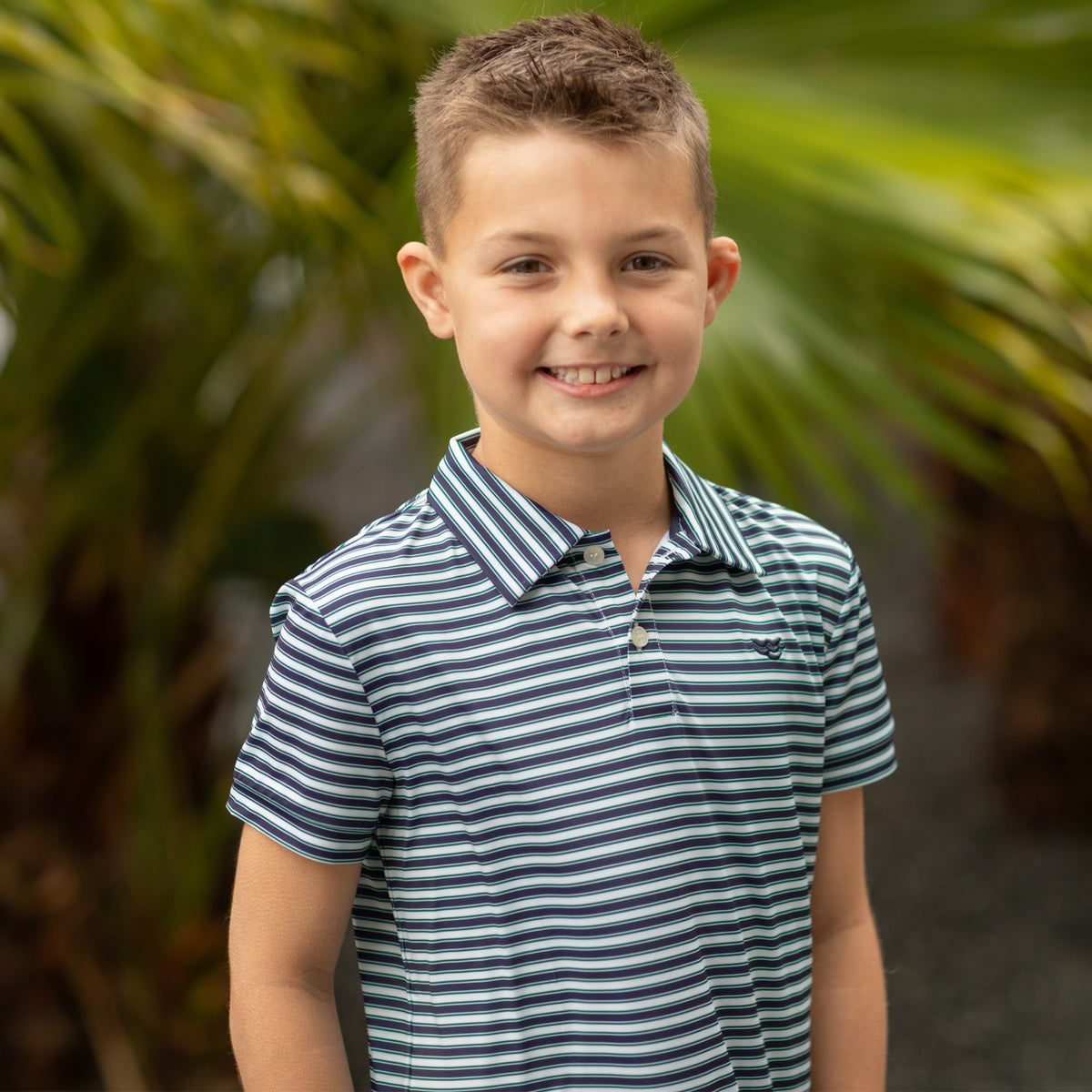 Henry Duvall Match Point Polo for boys in lightweight performance fabric, wrinkle-resistant and stain-resistant classic preppy polo shirt for school and everyday wear.