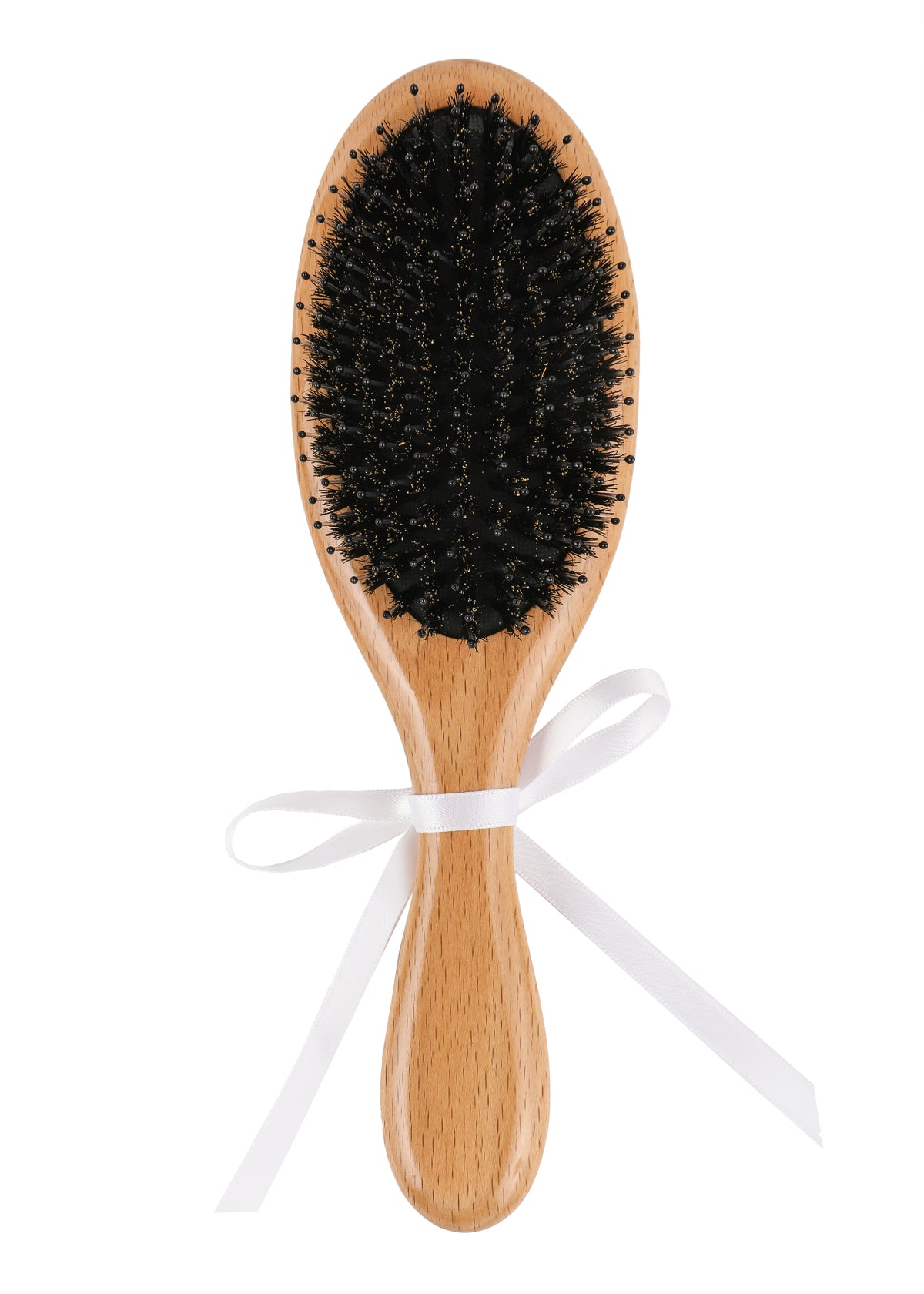 Top view of beechwood hairbrush showcasing dense black boar-hair and nylon pin bristles with white ribbon on white background
