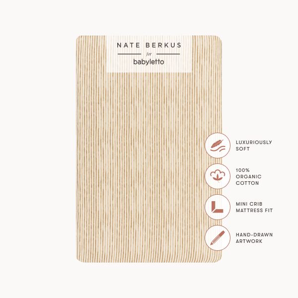 Front view of Autumn Stripe mini crib sheet in GOTS certified organic brushed cotton with feature callouts on a white background