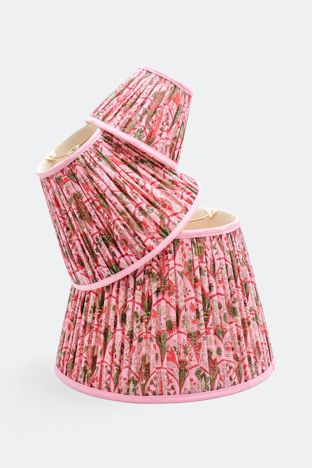 Stacked pink arch blockprint pleated lampshades with pink trim