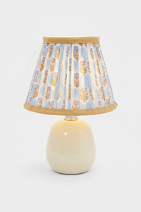 Illuminated sky blue daisy pleated lamp on cream base - Inner Child
