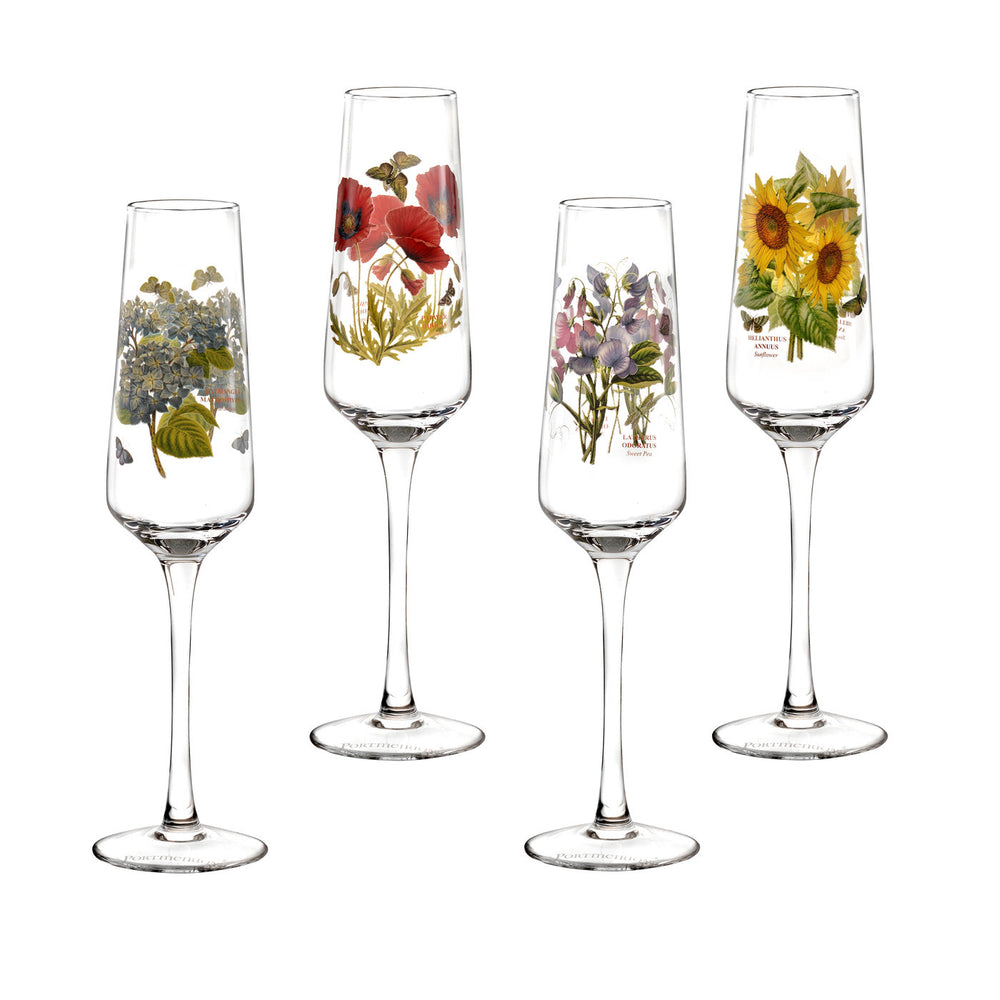 Front view of Botanic Garden champagne flutes set of 4 with different botanical motifs: sunflower, poppy, sweet pea, hydrangea on white background