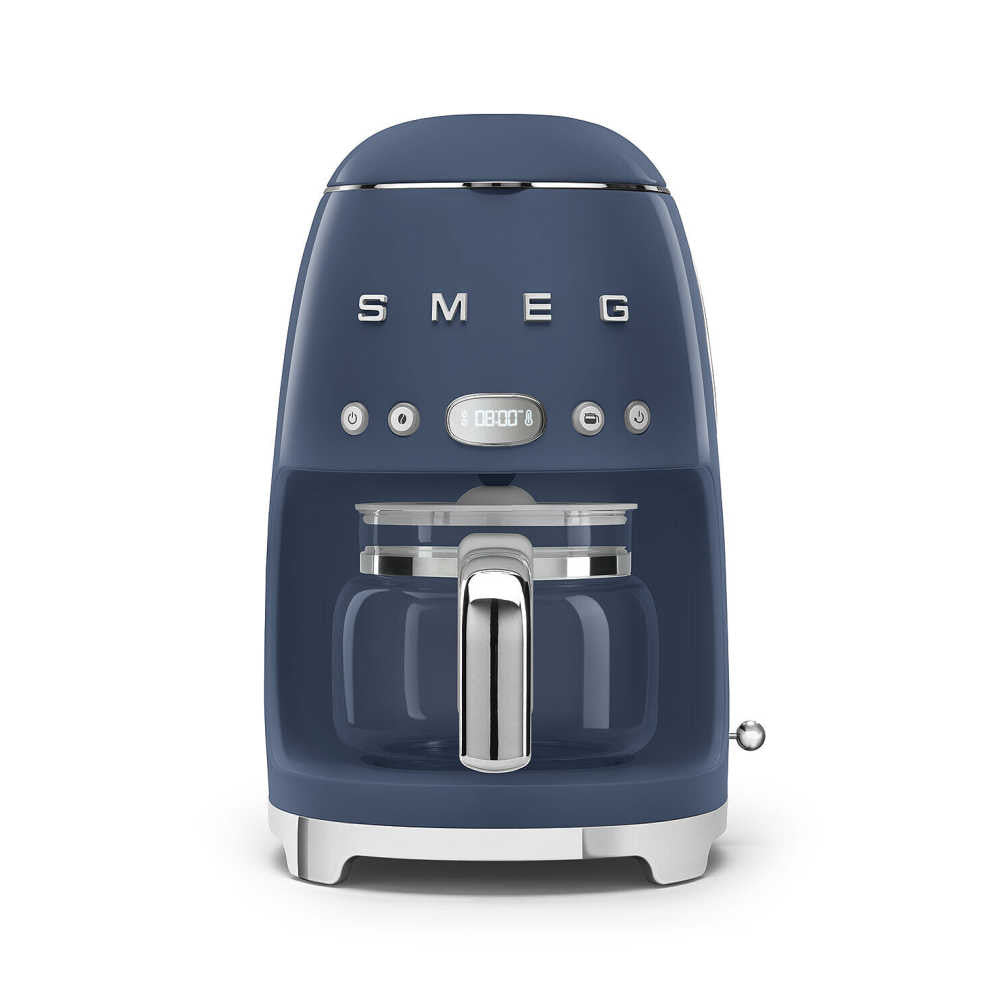 Front view of SMEG drip filter coffee machine showcasing glass 10-cup carafe, chrome handle and control panel, navy blue