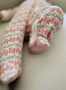 Close-up of Christmas Lobsters Zip Baby Onesie showcasing lobster print and red-and-white striped foot on a neutral background