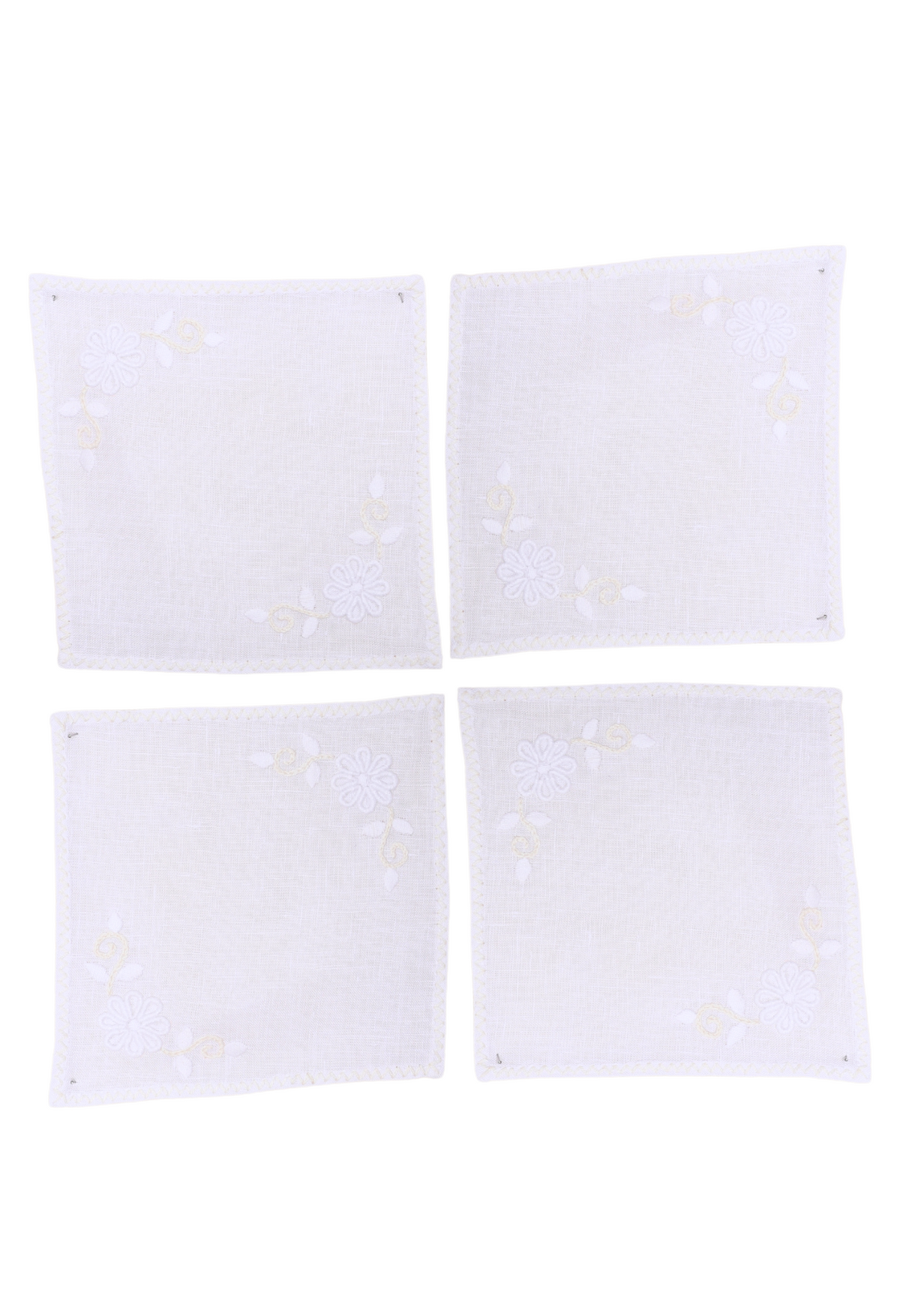 Front view of cocktail napkins in Bianca, set of 4, showcasing colorful floral embroidery on a white background