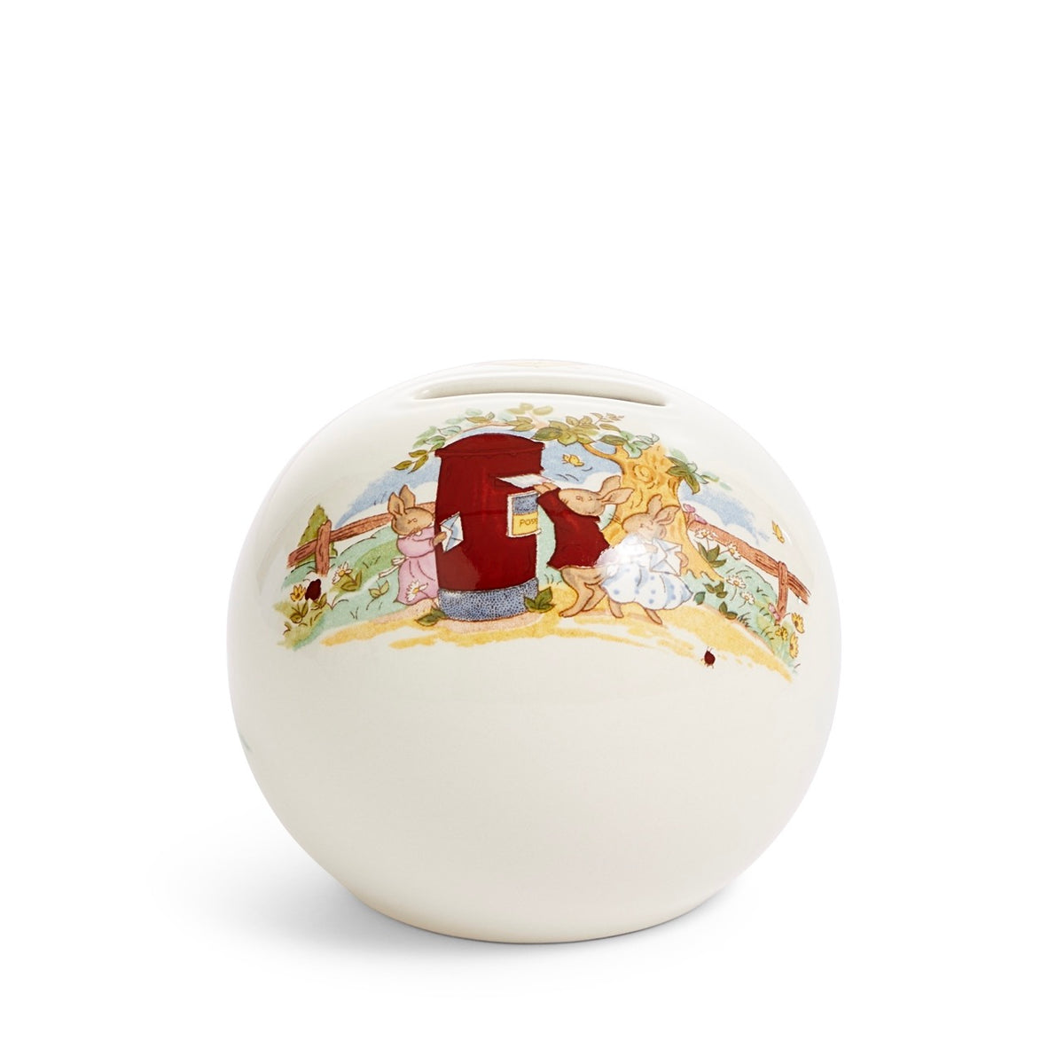 Front view of Bunnykins Money Ball Bank showcasing coin slot and rabbit illustration on cream fine bone china against white