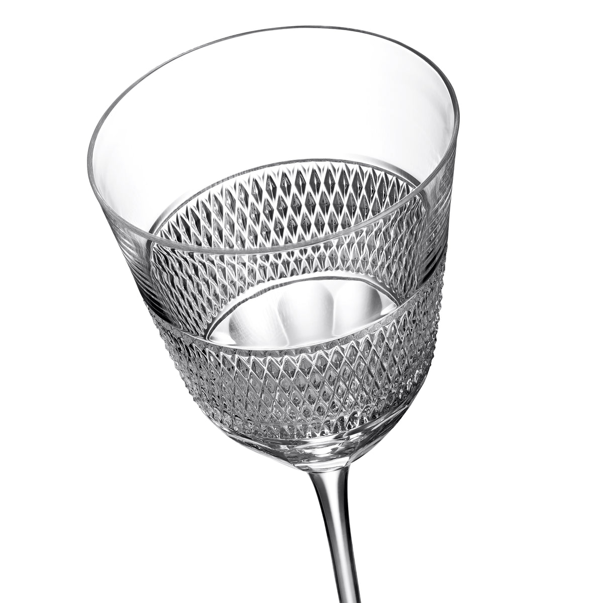 Angled view of Copper Coast Mastercraft white wine glass showcasing central band of diamond caro cuts and slim stem on white background
