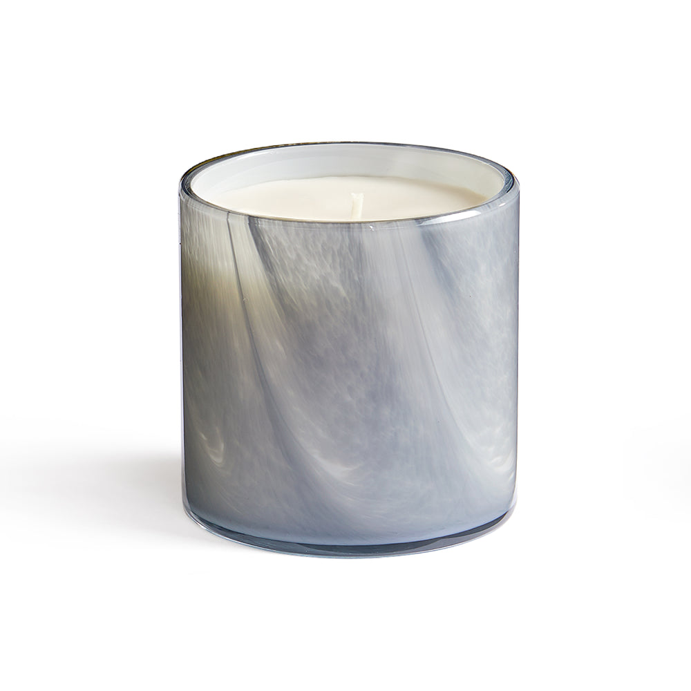 Front view of Timur Pepper signature candle showcasing marbled gray glass jar and single white wick on white background