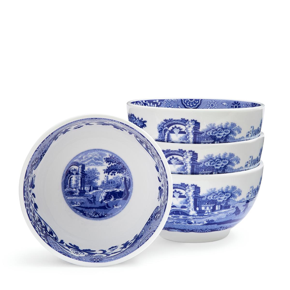 Front view of Blue Italian dip bowls, set of 4, showcasing blue-and-white porcelain scenes and Imari borders on white background