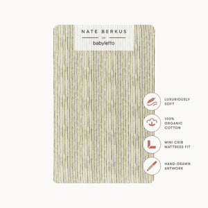Front view of Juniper Stripe mini crib sheet packaging showcasing GOTS organic cotton badges on a white background