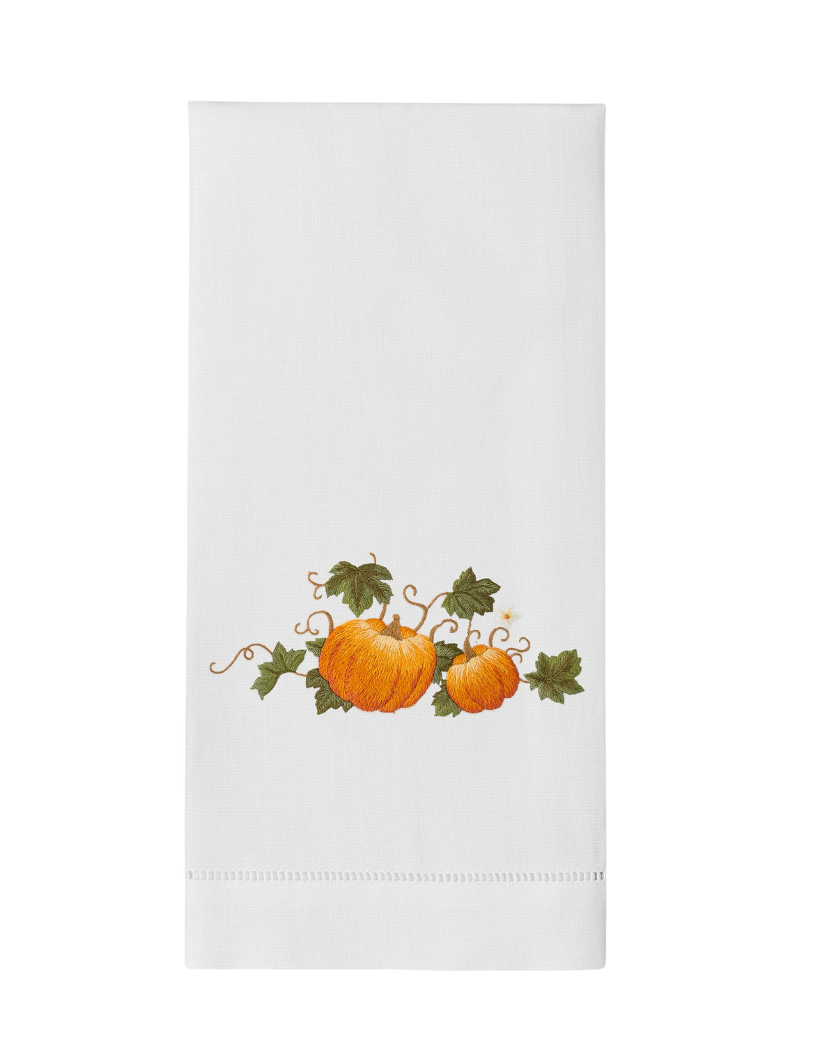 Flat-lay view of Pumpkins Grande hand towel showcasing hand-embroidered orange pumpkins and green leaves on white cotton