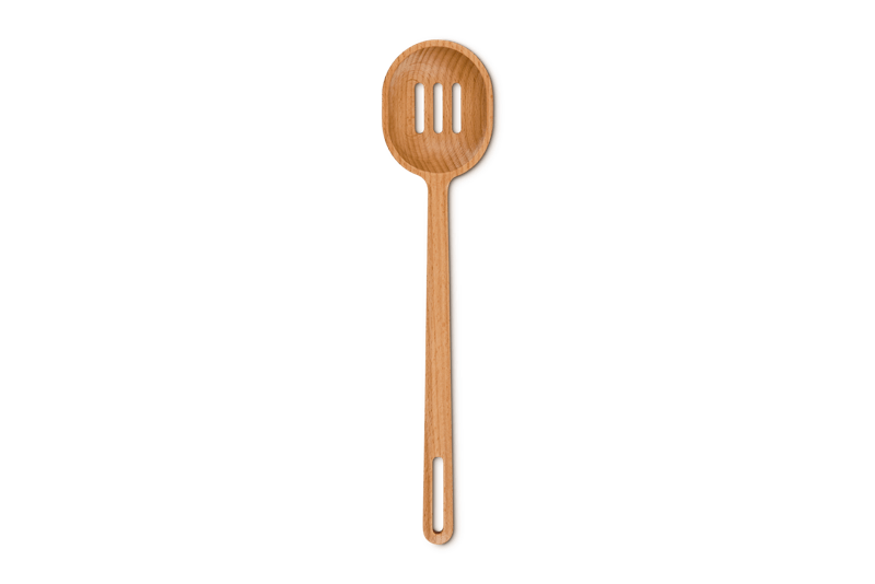 Top view of Signature wood slotted spoon showcasing three slots in the bowl and long handle on plain background