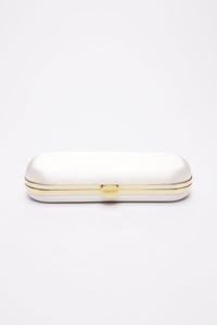 Elegant Bella Clutch Ivory Petite eyeglass case from The Bella Rosa Collection with gold trim and clasp closure on a white background, crafted as a bespoke accessory.