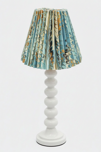 White table lamp with blue and gold marbled pleated empire lampshade