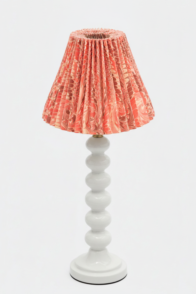 Table lamp with white stacked base and 8" hand-marbled pleated empire lampshade