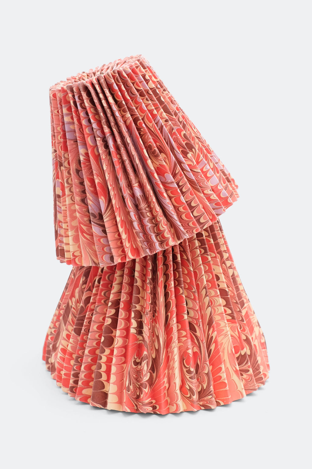 Stack of 8-inch hand-marbled pleated empire lampshades in florentine pink designs