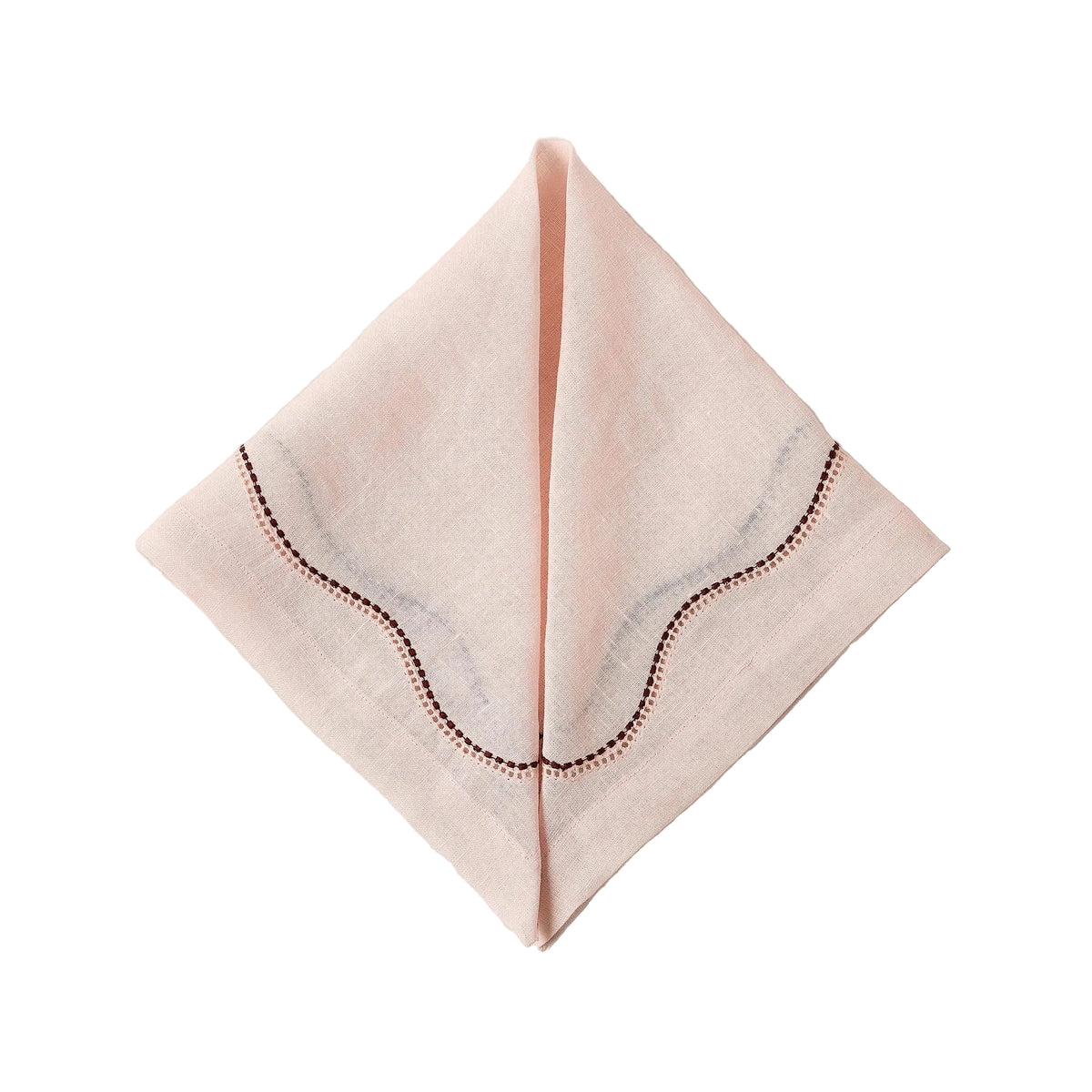 Front view of Le Chemin Napkin in Light Pink showcasing curved artisanal detailing on folded linen with a white background